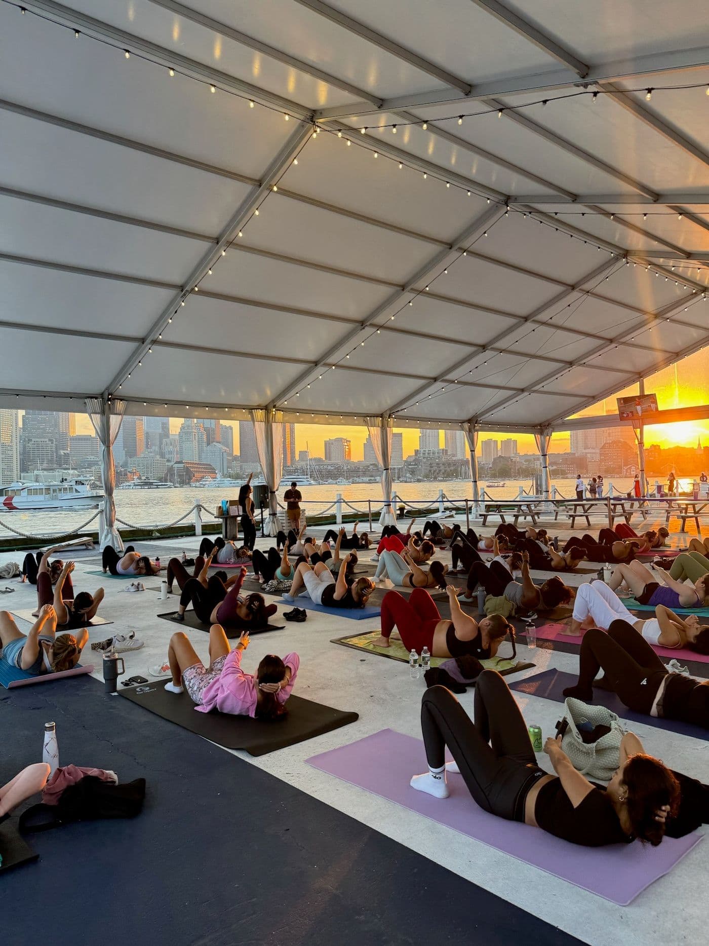 Outdoor Pilates class at Tall Ship Boston.