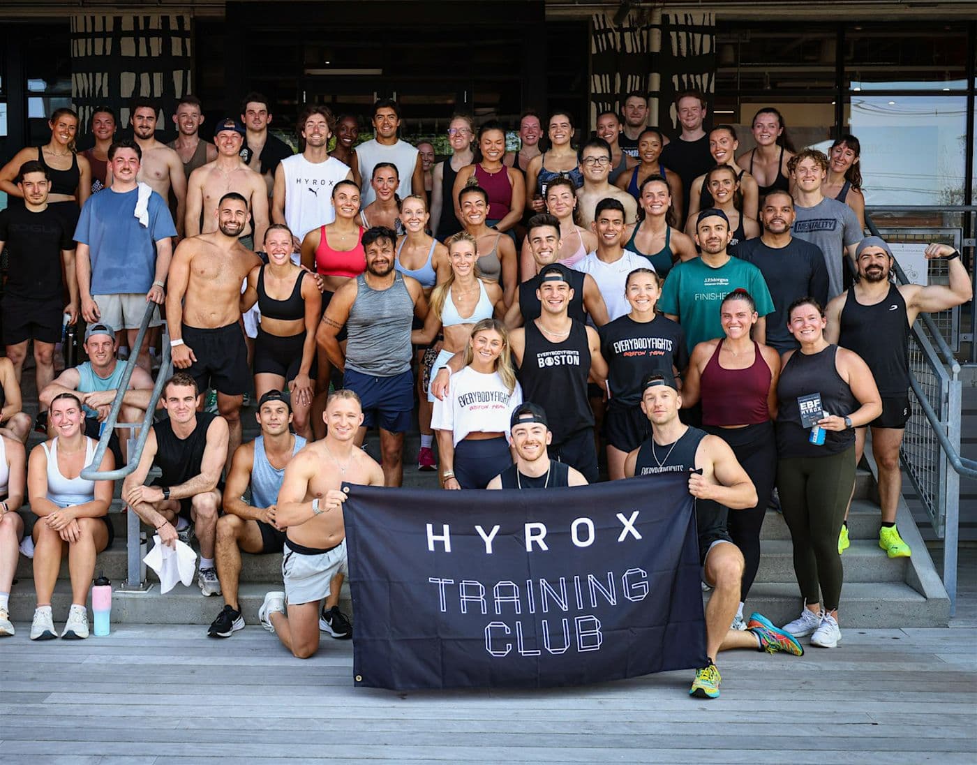 Athletes training for HYROX Boston 2026 — functional fitness stations and running at a Everybody Fights in Boston ahead of the October race.