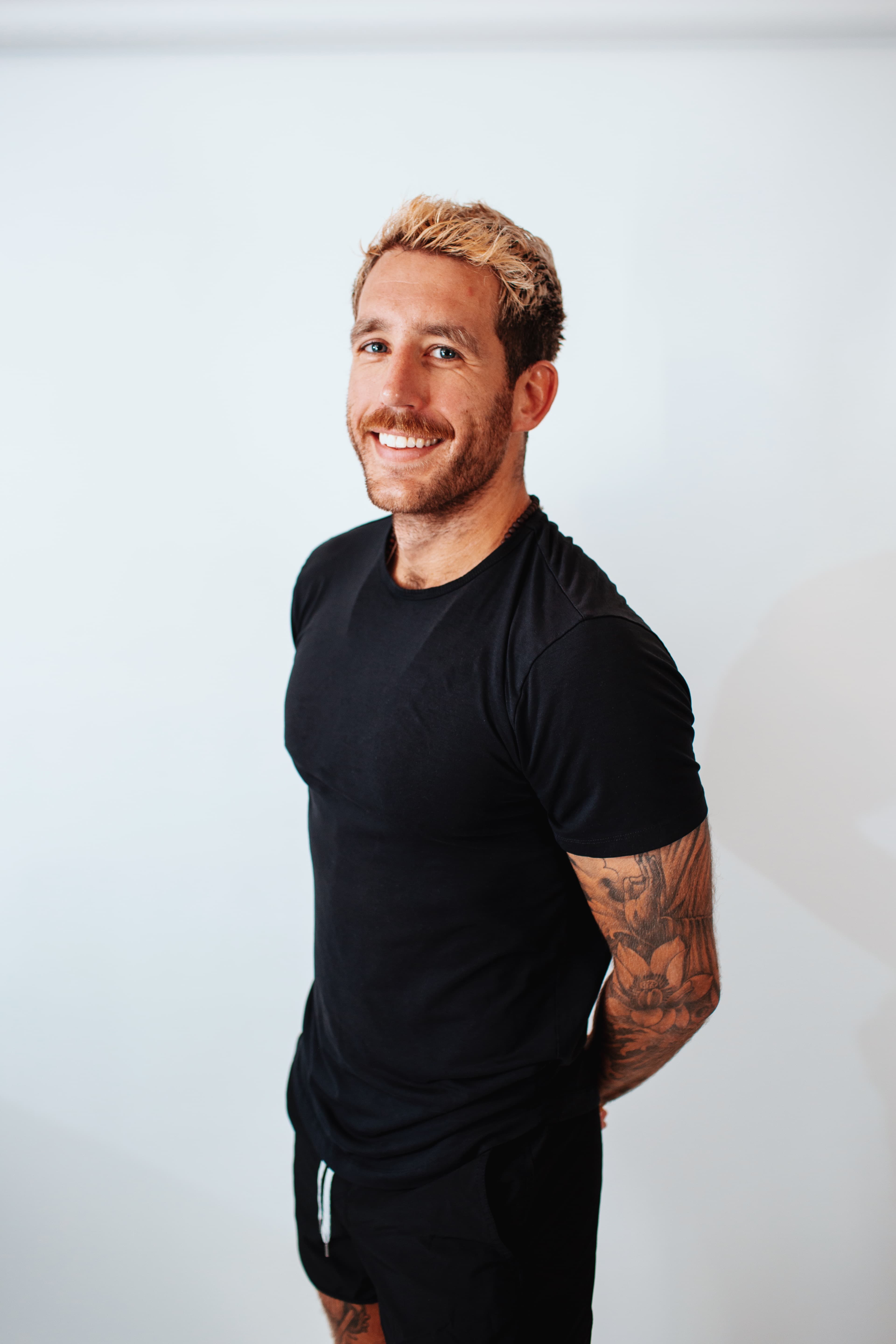 Tobey Stohr, one of the instructors leading the Rooftop Wellness Series final event at View Boston