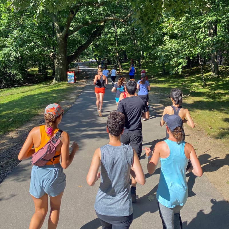 Fit Scene Run Club Tour participants running together in Boston