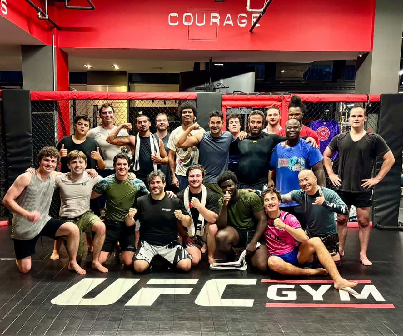 Boxing workout at a Boston fitness studio featuring boxing gloves, heavy bags, and a space for boxing and conditioning classes.