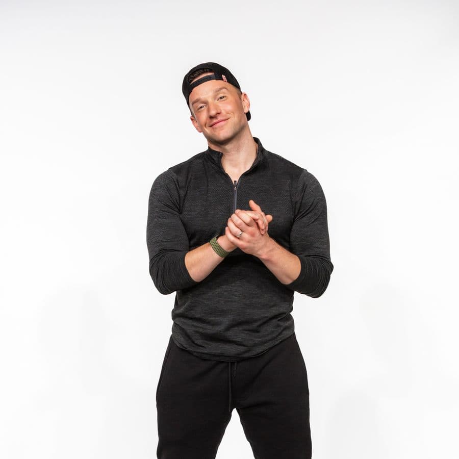 Portrait of Michael James, Boston-based LGBTQ+ trainer and community leader, celebrating Pride through fitness